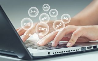 woman typing choosing a domain name